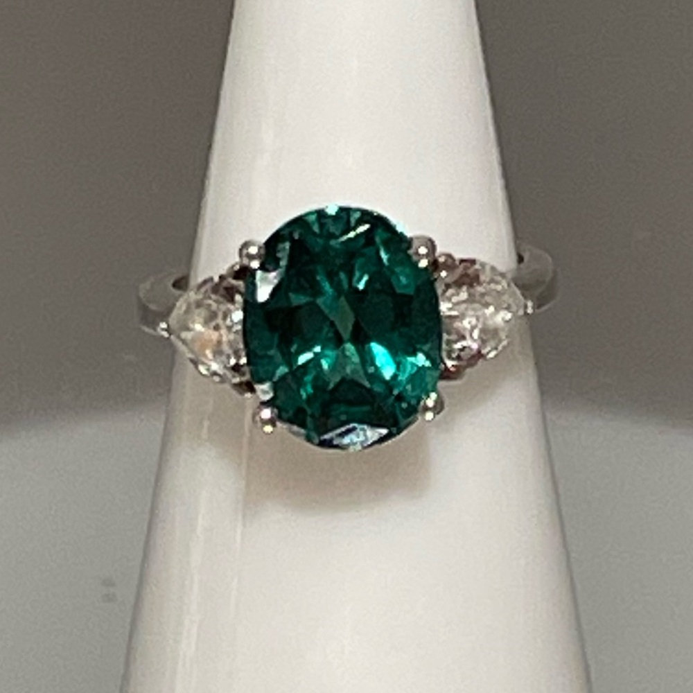 Three Stone Ring 5 Carat Oval Lab Emerald and Heart Shaped Diamond Sides